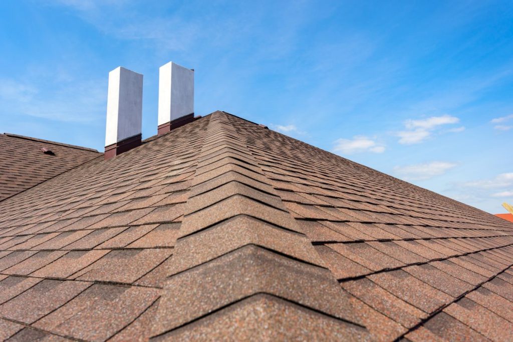 asphalt shingle with ridge cap shingles on a roof in Lakeville