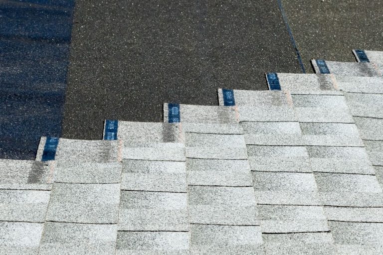 asphalt shingles being installed on top of roof underlayment, Lakeville